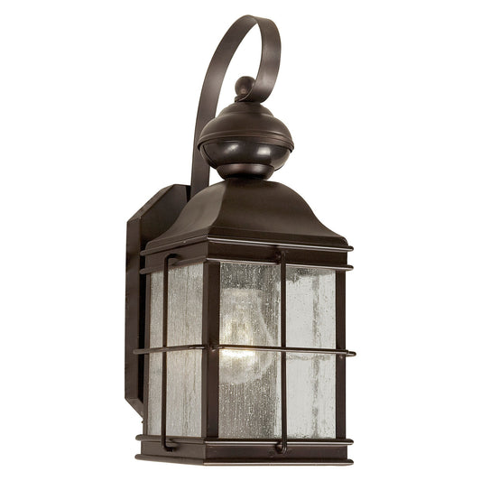 Forte Lighting Essex 6" Steel Antique Bronze Dusk To Dawn Motion Sensor Outdoor Wall Light With Clear Seeded Glass Panels Shade