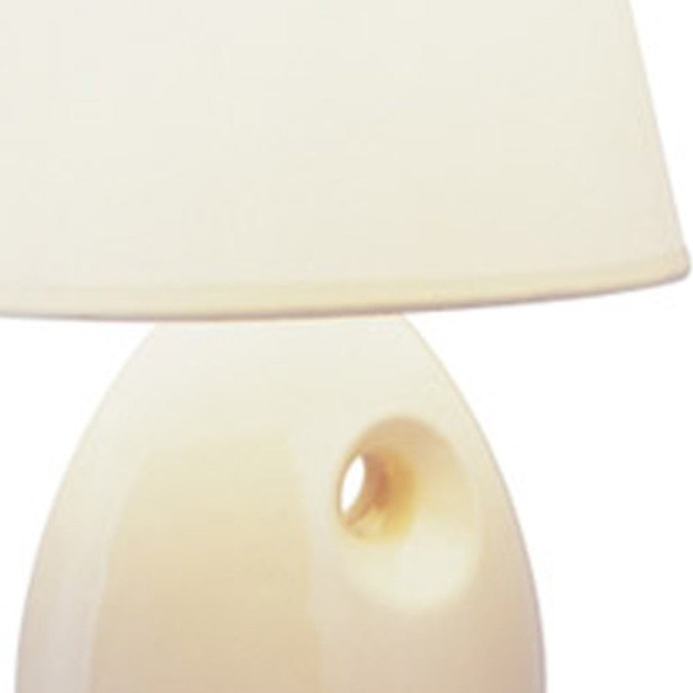 HomeRoots 13" Bedside Table Lamp With White Shade and Beige Ceramic Finish