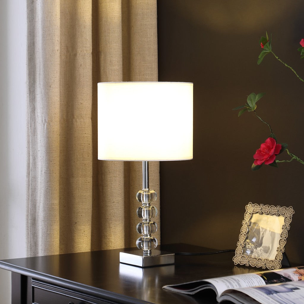 HomeRoots 18” Modern Crystal Quatro Orb And Silver Metal Table Lamp With White Finish