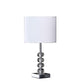 HomeRoots 18” Modern Crystal Quatro Orb And Silver Metal Table Lamp With White Finish