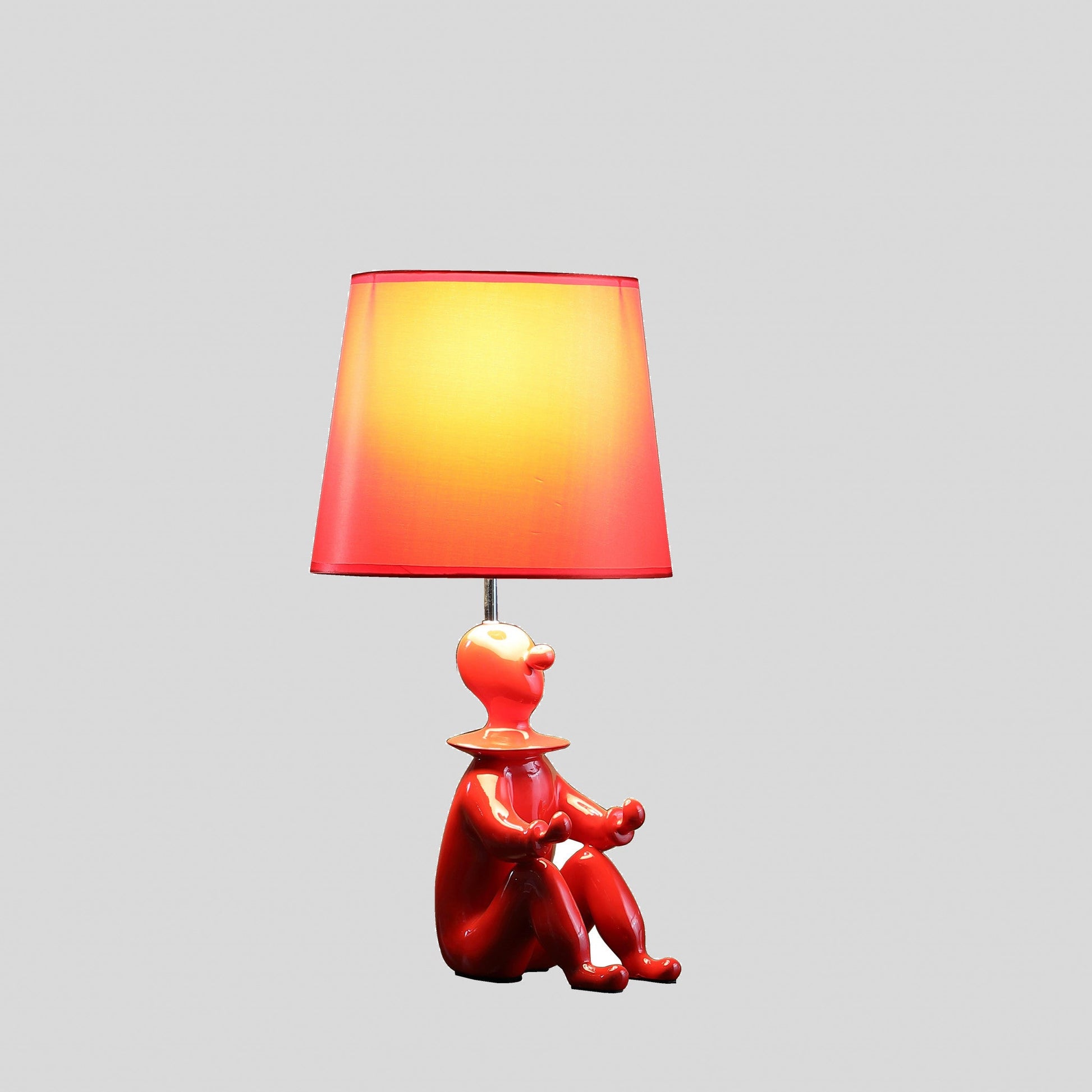 HomeRoots 21” Sculptural Desk Lamp With Empire Shade in Red Finish