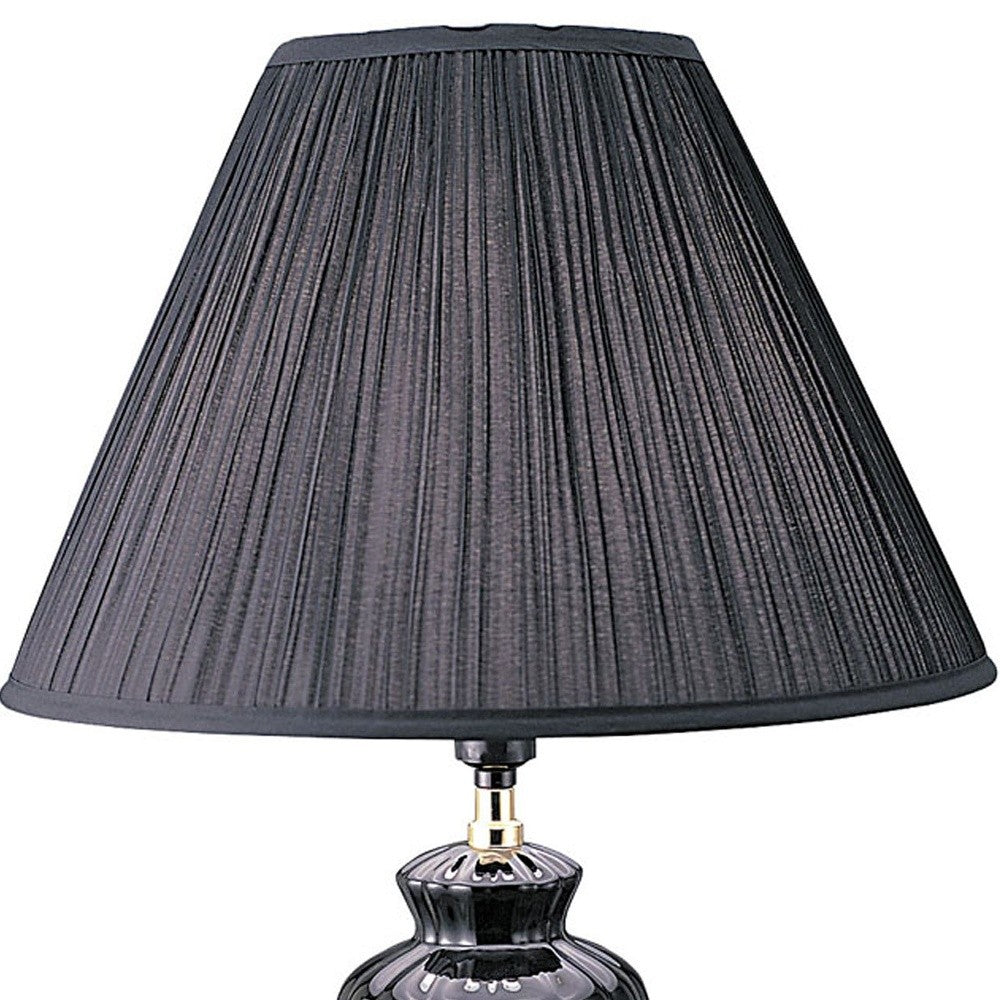 HomeRoots 26” Stylish Black Ceramic Urn Shape Table Lamp With Gold Base Finish