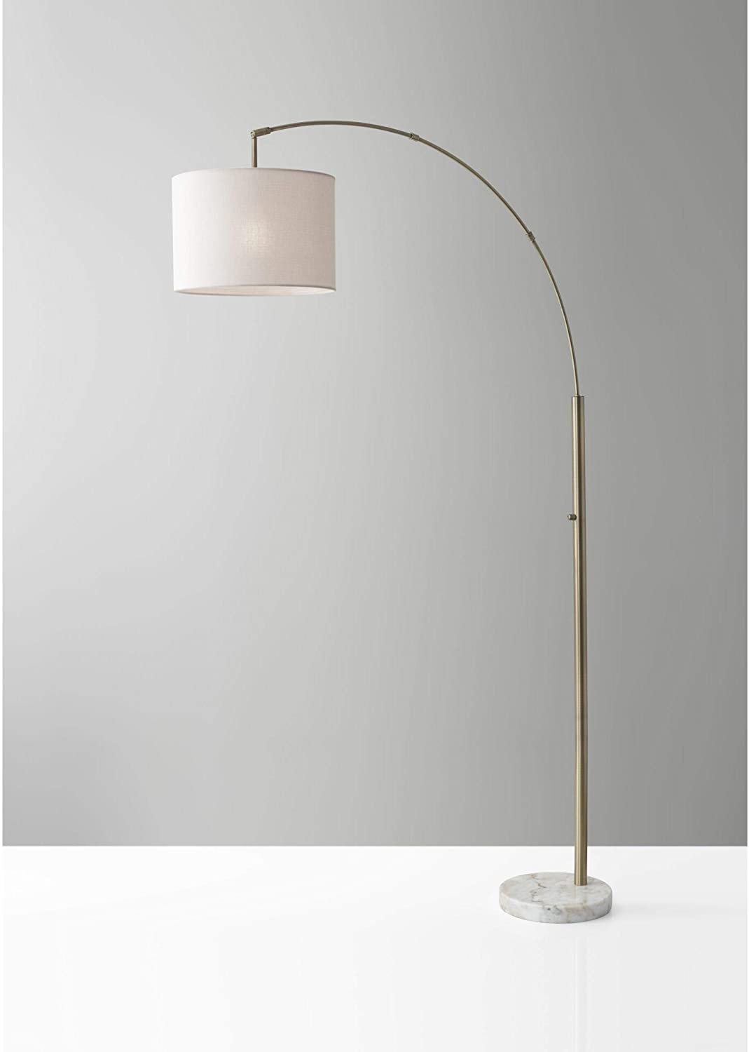 HomeRoots 74" Arc Floor Lamp With Off White Solid Color Drum Shade in Antique Brass Finish