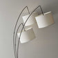HomeRoots 74" Three Light Arc Floor Lamp With Suspended White Drum Shades in Brushed Steel Metal Finish