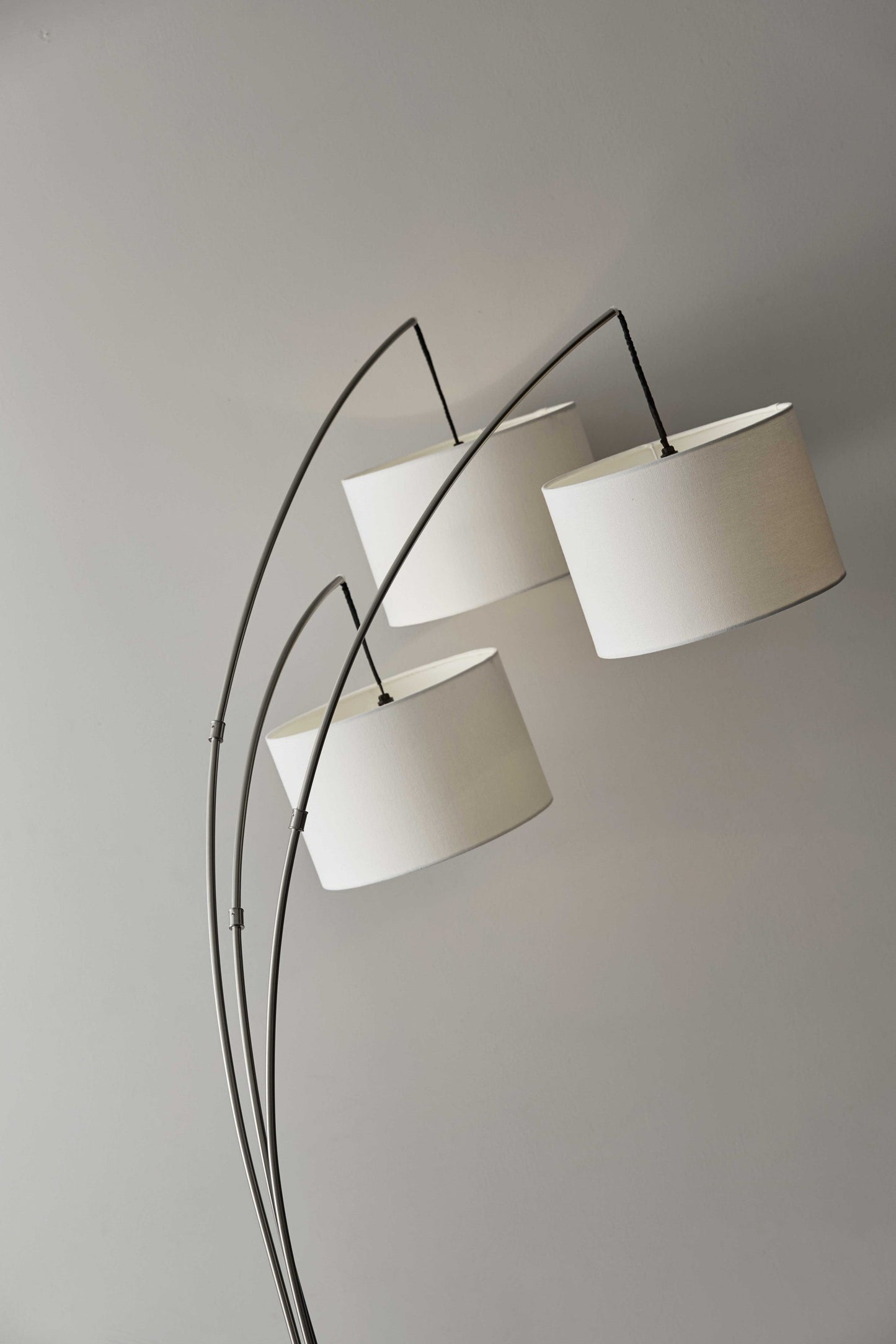 HomeRoots 74" Three Light Arc Floor Lamp With Suspended White Drum Shades in Brushed Steel Metal Finish