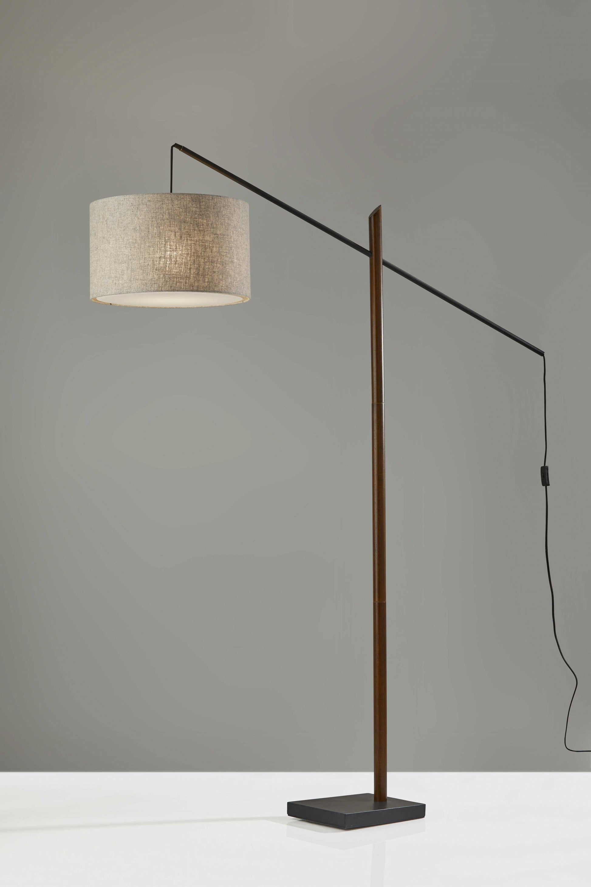 HomeRoots 77" Swing Arm Floor Lamp With Beige Drum Shade and Black Finish