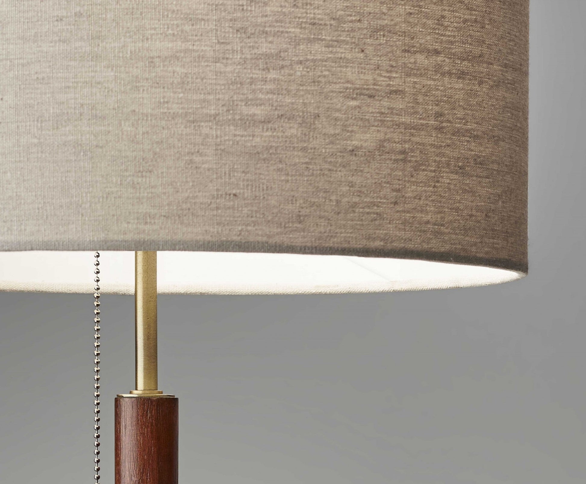 HomeRoots Antique Brass Metal and Walnut Wood Table Lamp With Beige Drum Shade