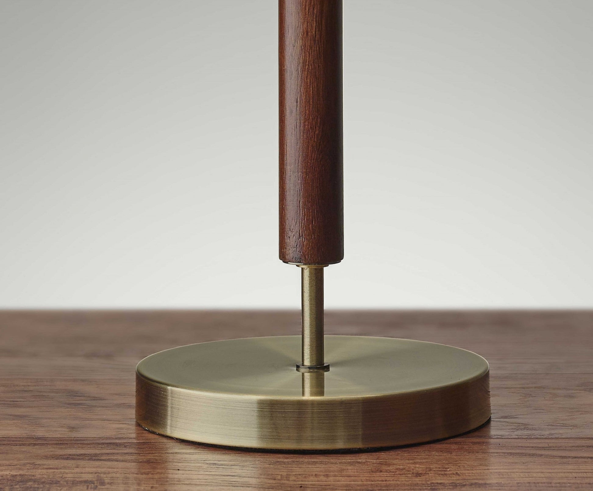 HomeRoots Antique Brass Metal and Walnut Wood Table Lamp With Beige Drum Shade