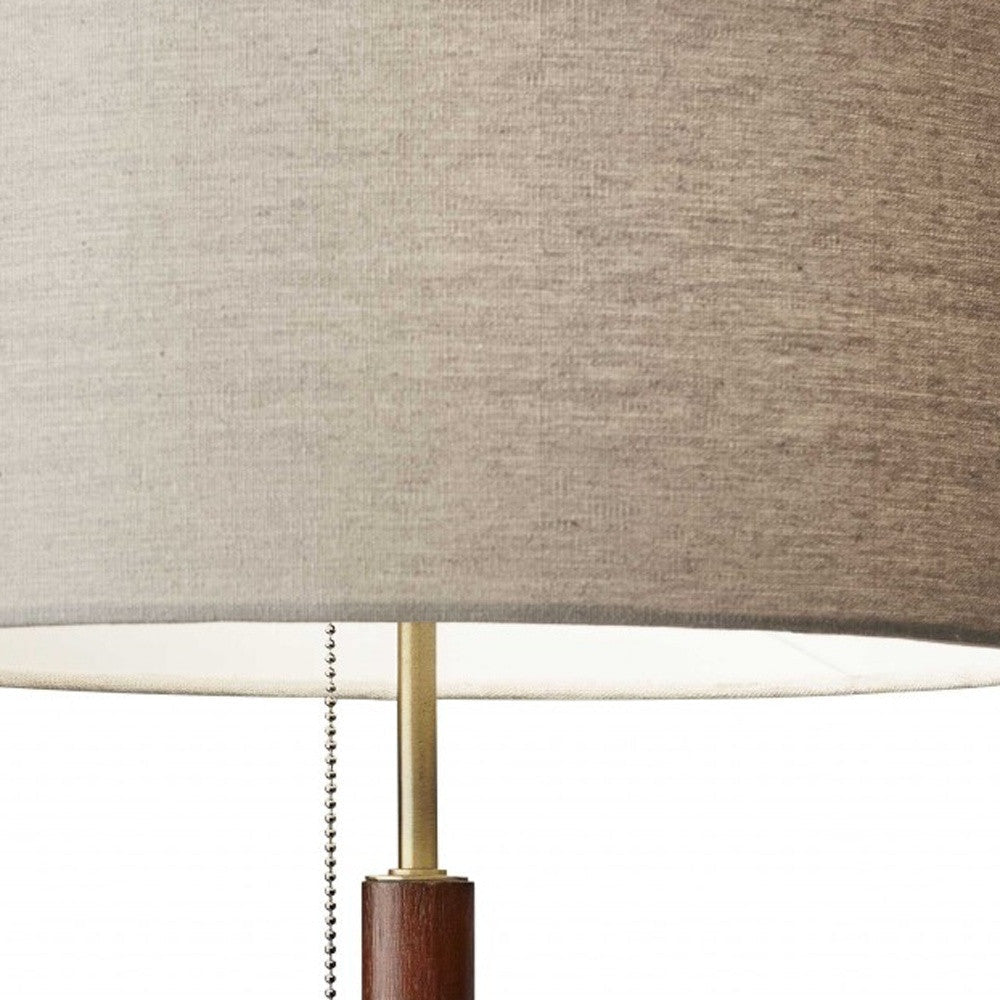 HomeRoots Antique Brass Metal and Walnut Wood Table Lamp With Beige Drum Shade