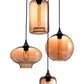 HomeRoots Four Light Metal Dimmable Ceiling Light With Amber Shades
