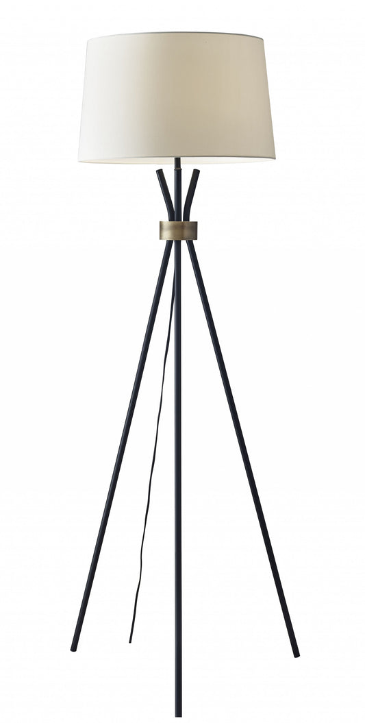 HomeRoots Metal Floor Lamp With Tripod Leg and Antique Brass Accent in Black Finish