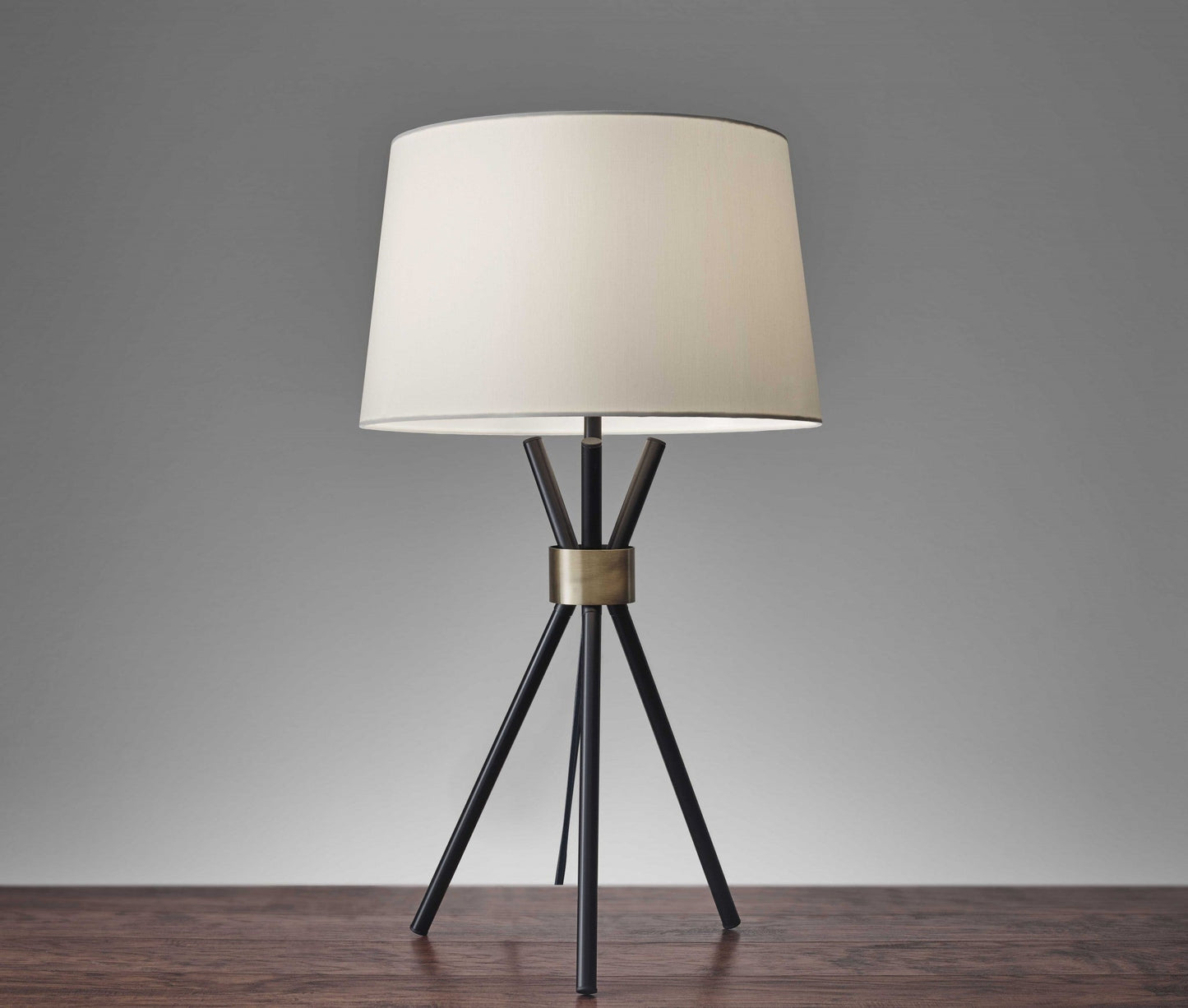 HomeRoots Metal Tripod Leg in Black with Antique Brass Accent Table Lamp