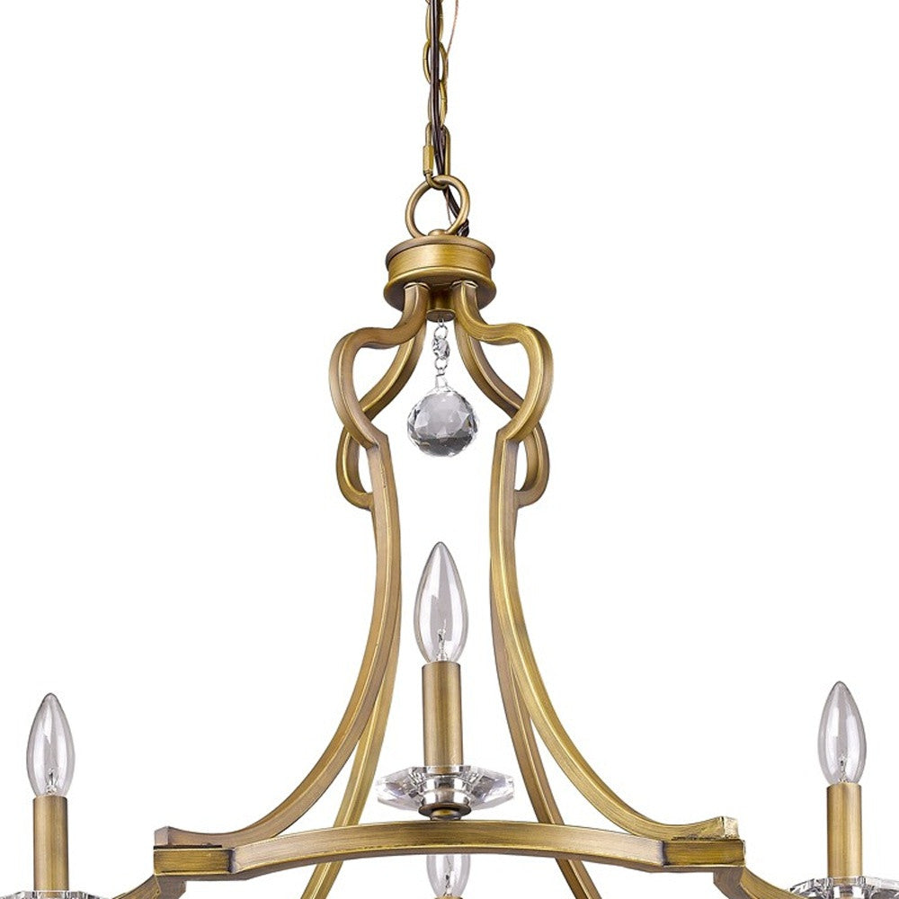 HomeRoots Peyton 4-Light Chandelier in Raw Brass Finish With Crystal Accents