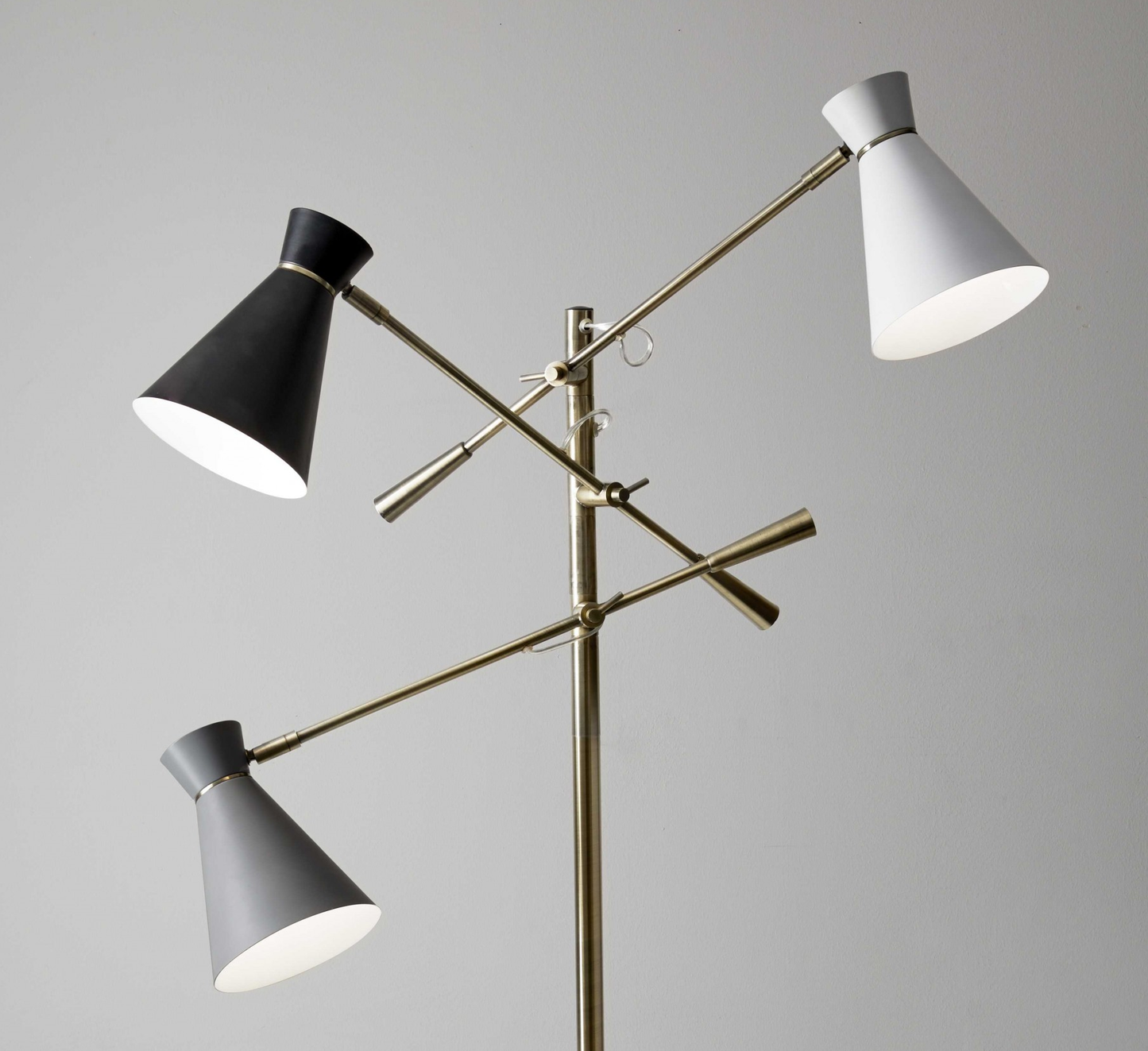 HomeRoots Three Arm Adjustable Floor Lamp in Brass Metal With Grey Black and White Shades
