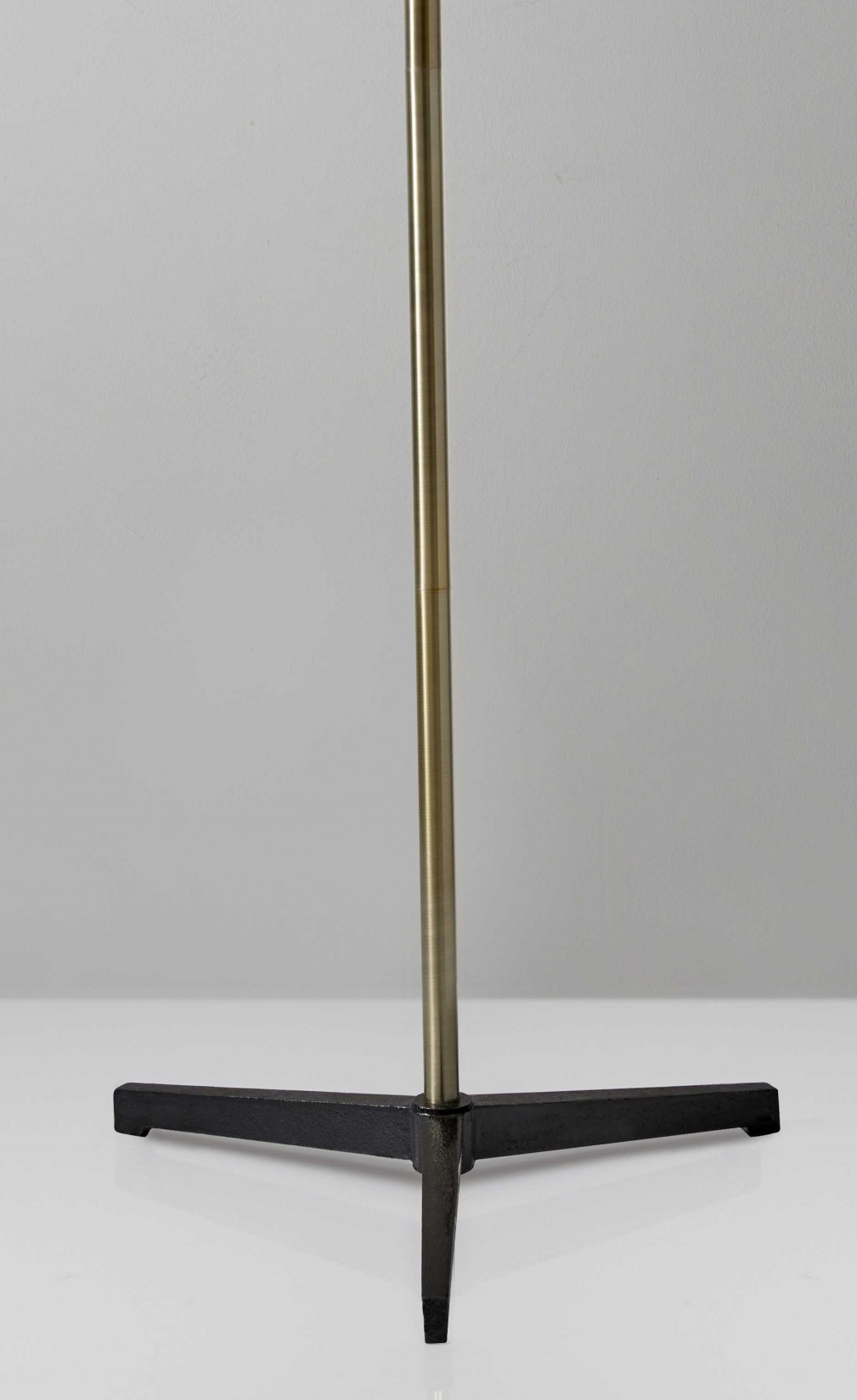 HomeRoots Three Arm Adjustable Floor Lamp in Brass Metal With Grey Black and White Shades