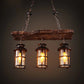 HomeRoots Three Light Hanging Lantern Chandelier With Rustic Wood and Metal Finish