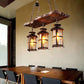 HomeRoots Three Light Hanging Lantern Chandelier With Rustic Wood and Metal Finish