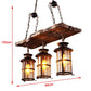 HomeRoots Three Light Hanging Lantern Chandelier With Rustic Wood and Metal Finish