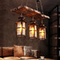 HomeRoots Three Light Hanging Lantern Chandelier With Rustic Wood and Metal Finish