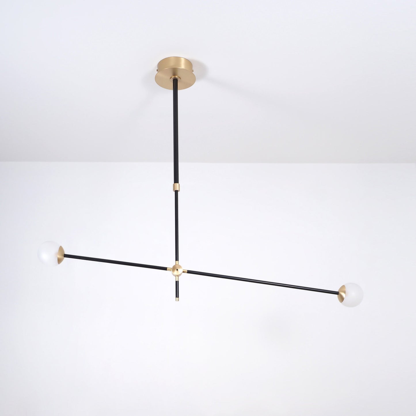 Intueri Light Bullarum 45" X 4" Brass or Copper Chandelier With Hand-Blowen Glass