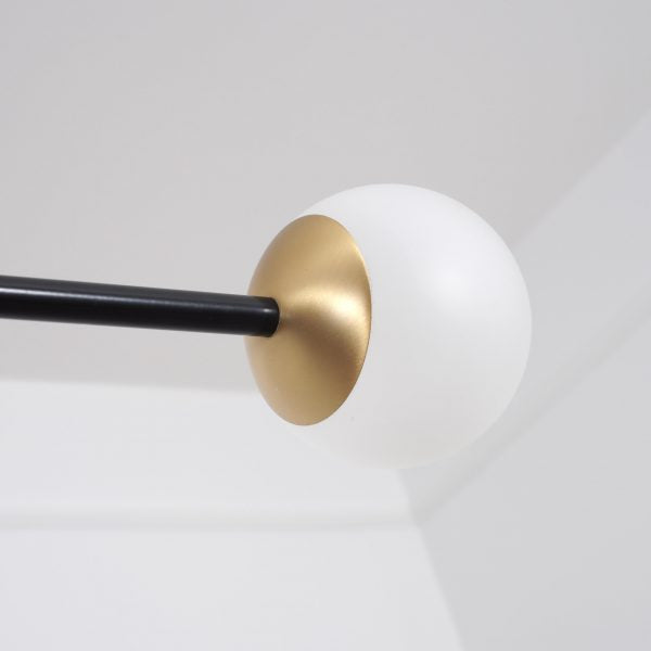 Intueri Light Bullarum 46" x 4" x (32" - 41") Brass or Copper Chandelier With Hand-Blowen Glass