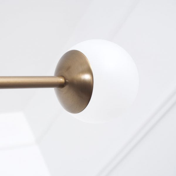 Intueri Light Bullarum 46" x 4" x (32" - 41") Brass or Copper Chandelier With Hand-Blowen Glass