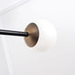 Intueri Light Bullarum 49" x 4" x (23" - 32") Brass or Copper Chandelier With Hand-Blowen Glass