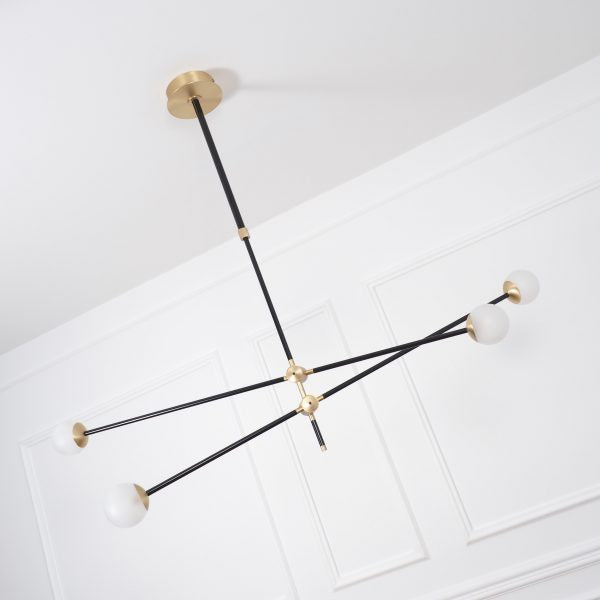 Intueri Light Bullarum 49" x 4" x (23" - 32") Brass or Copper Chandelier With Hand-Blowen Glass