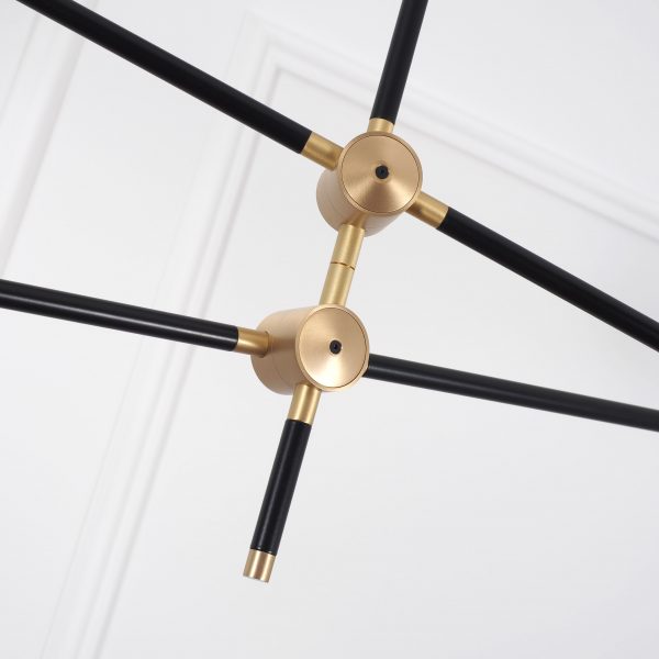 Intueri Light Bullarum 49" x 4" x (23" - 32") Brass or Copper Chandelier With Hand-Blowen Glass