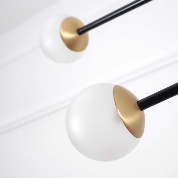 Intueri Light Bullarum 49" x 4" x (23" - 32") Brass or Copper Chandelier With Hand-Blowen Glass