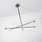 Intueri Light Bullarum 49" x 4" x (23" - 32") Brass or Copper Chandelier With Hand-Blowen Glass