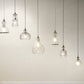 Jamie Young Curved 7" 1-Light Handblown Clear Seeded Glass Pendant Light