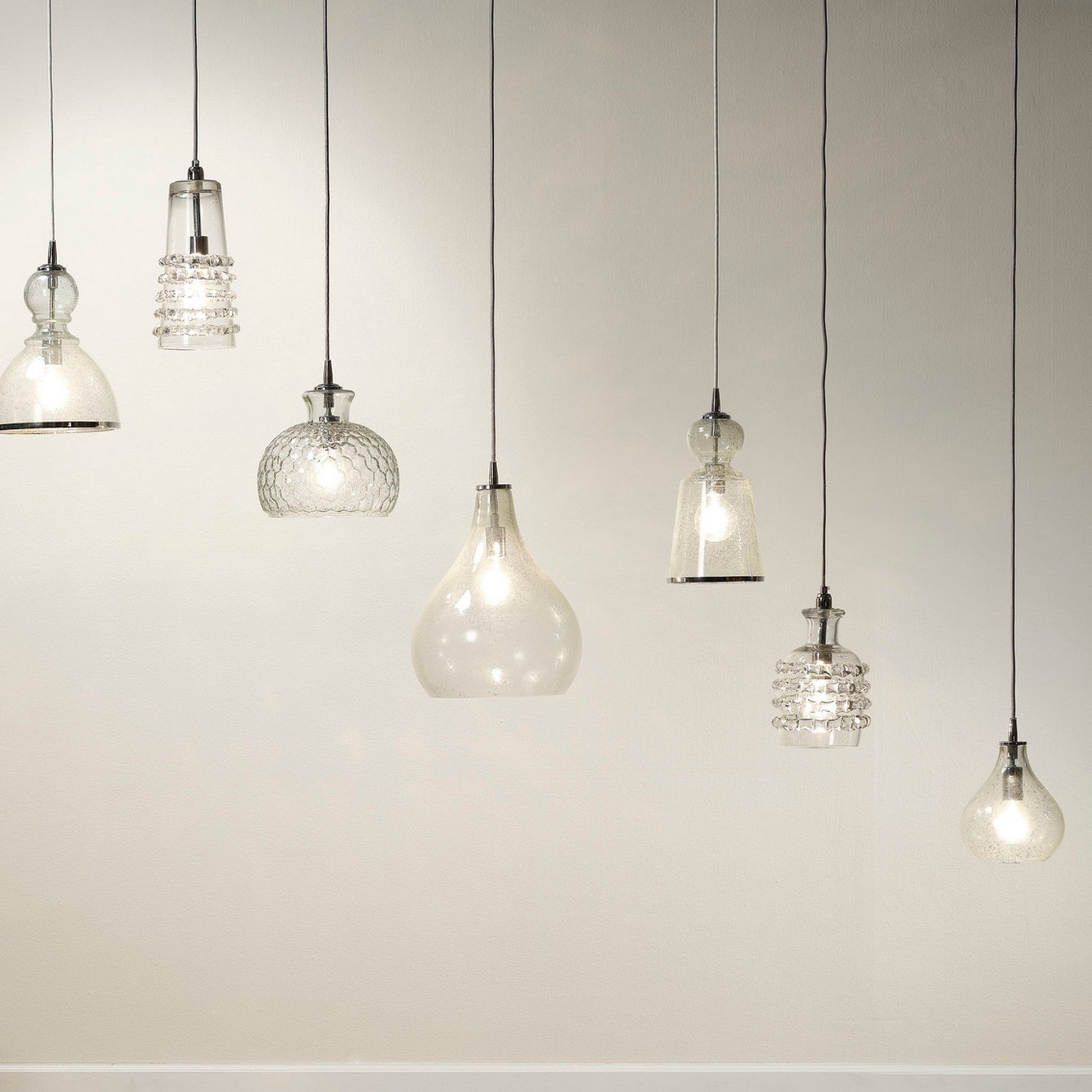 Jamie Young Curved 7" 1-Light Handblown Clear Seeded Glass Pendant Light