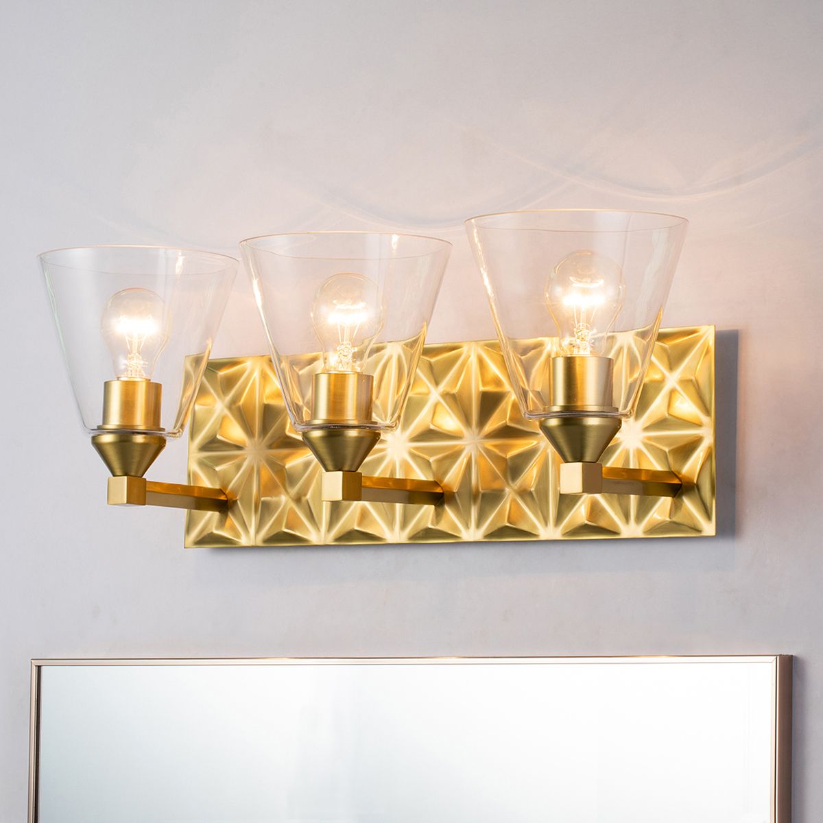 Lucas & McKearn Alpha 3-Light Aged Brass Wall Light With Cone Shape Clear Glass Shade