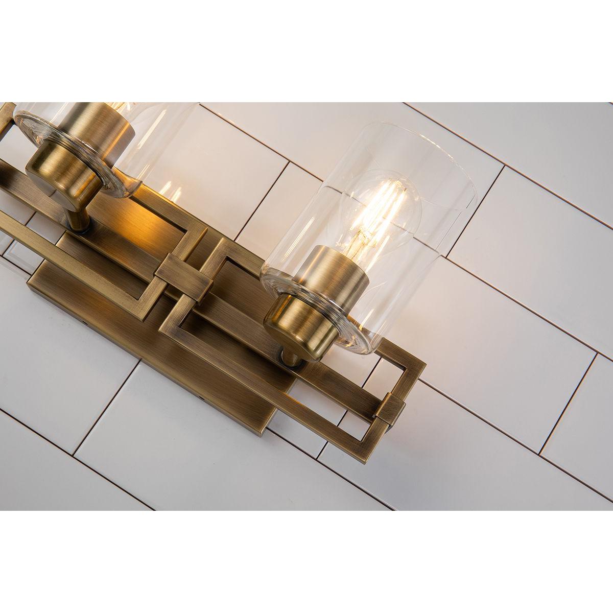 Lucas & McKearn Estes 2-Light Antique Brass Wall Light With Cylinder Shape Clear Glass Shade