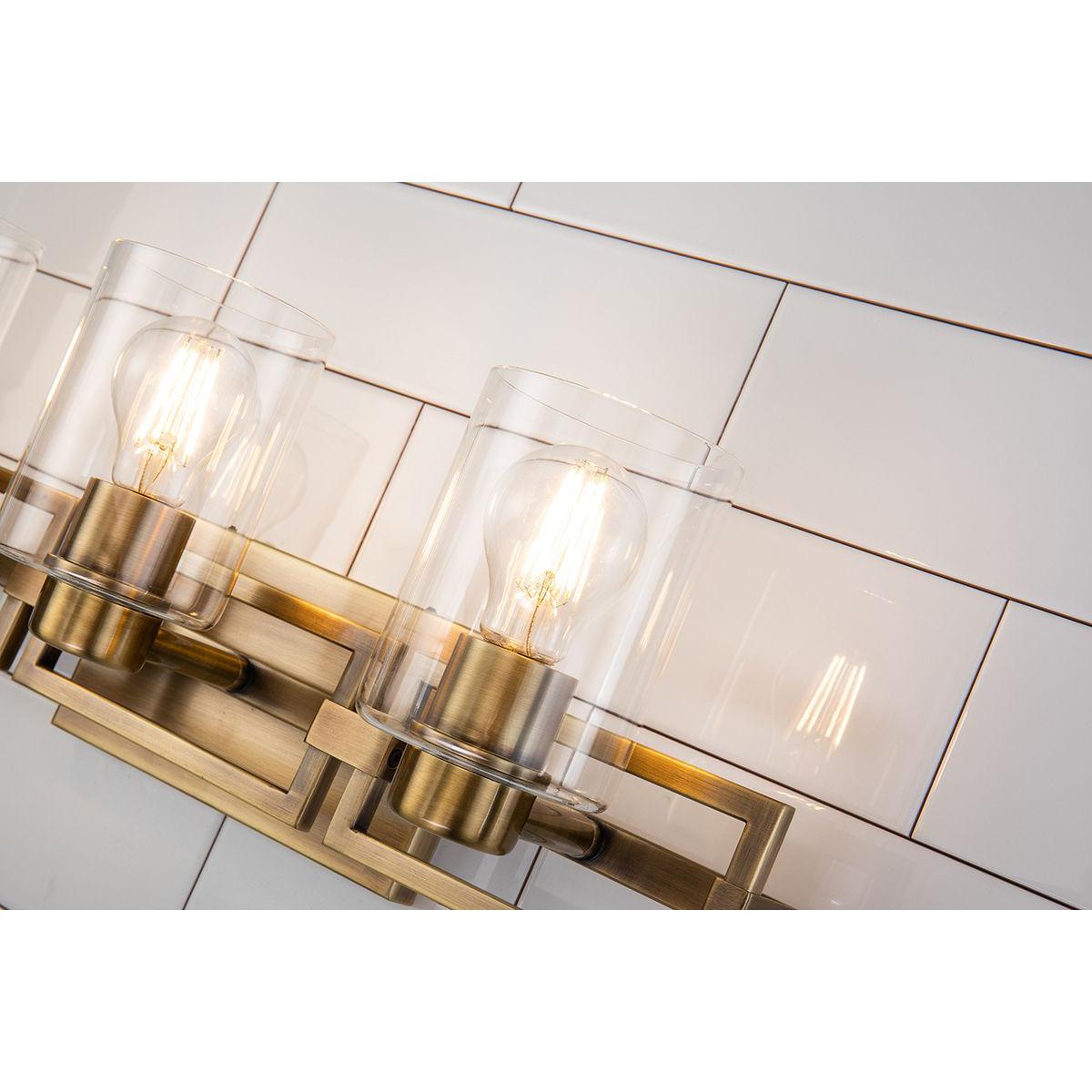 Lucas & McKearn Estes 3-Light Antique Brass Wall Light With Cylinder Shape Clear Glass Shade