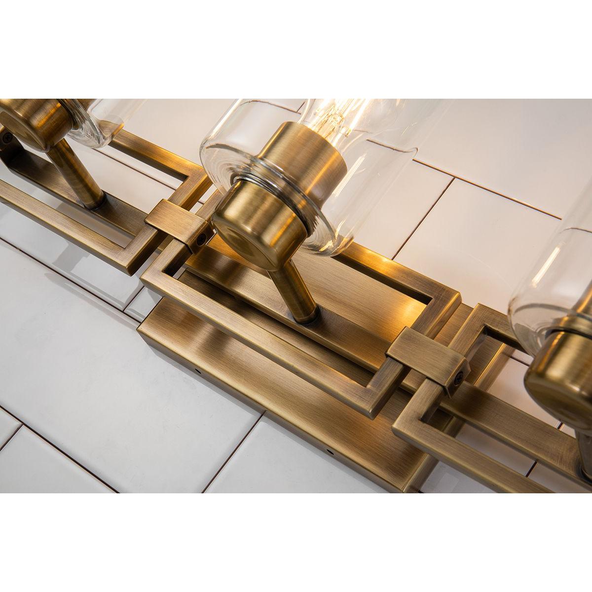 Lucas & McKearn Estes 3-Light Antique Brass Wall Light With Cylinder Shape Clear Glass Shade