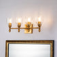 Lucas & McKearn Felice 4-Light Antique Gold Leaf Bar Light With Clear Glass Shade and Flame Gold Accent