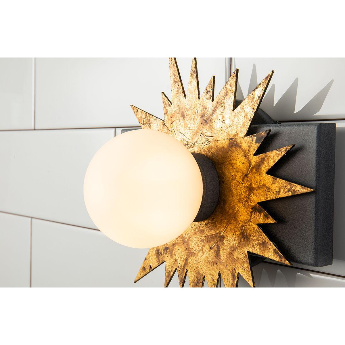 Lucas & McKearn Soleil 1-Light Weathered Zinc and Antique Gold Leaf Star-Shaped Wall Light With Sanded Glass Globe Shade