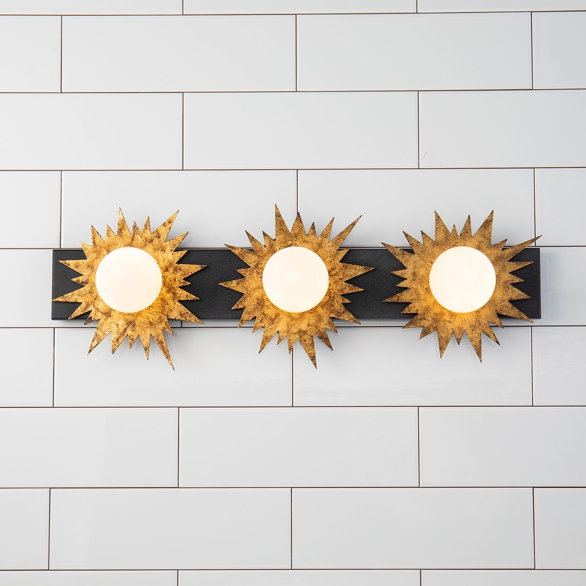 Lucas & McKearn Soleil 3-Light Weathered Zinc and Antique Gold Leaf Star-Shaped Wall Light With Sanded Glass Globe Shade