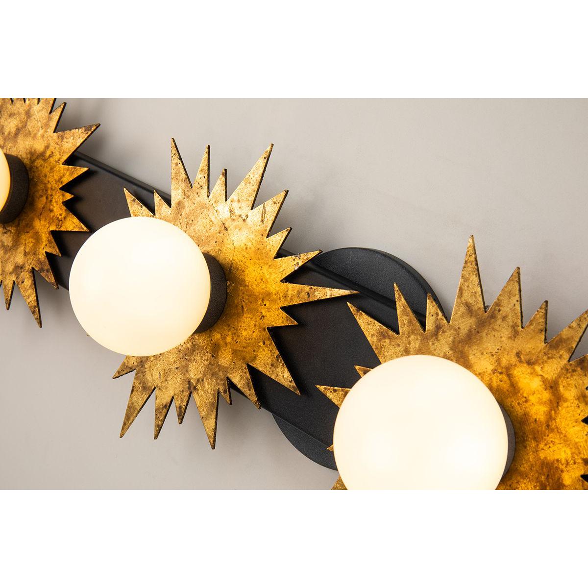 Lucas & McKearn Soleil 4-Light Weathered Zinc and Antique Gold Leaf Star-Shaped Wall Light With Sanded Glass Globe Shade