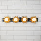 Lucas & McKearn Soleil 4-Light Weathered Zinc and Antique Gold Leaf Star-Shaped Wall Light With Sanded Glass Globe Shade