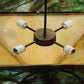 Meyda Lighting Balsam Pine 39" 4-Light Antique Copper Inverted Pendant Light With Green Brown And Beige Iridescent Shade Glass
