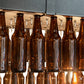 Meyda Lighting Beer 144" 6-Light Textured Black Beer Garden Chandelier With Amber Bottle Shade Glass