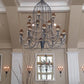 Meyda Lighting Bell 72" 20-Light 3-Tier Wrought Iron Chandelier With Amber Faux Candlelight