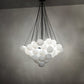 Meyda Lighting Bola 44" 8-Light Solar Black Cascading Pendant Light With White Statuario Idalight Shade