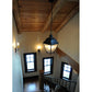 Meyda Lighting Boston 20" 4-Light Wrought Iron Lantern Pendant Light With Clear Seeded Shade Glass