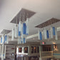 Meyda Lighting Cilindro 48" 15-Light Nickel Cascading Pendant Light With Blue and Clear Shade Glass