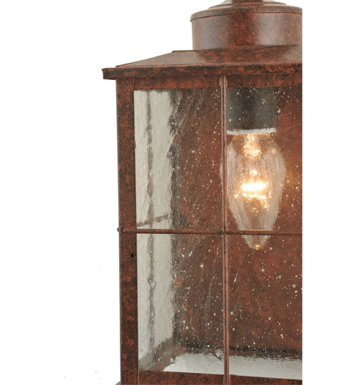 Meyda Lighting Coolidge 7" Antique Rust Wall Sconce With Clear Seeded Lantern Shade Glass