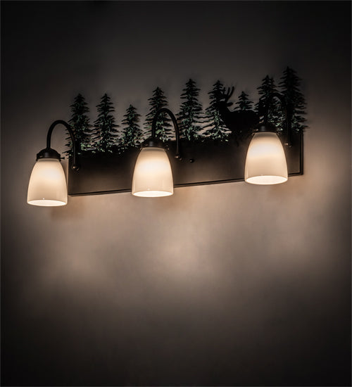 Meyda Lighting Deer 27" 3-Light Textured Black & Green Trees Vanity Light With White Opal Shade Glass